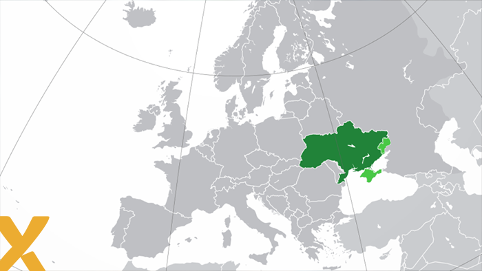 Kaart van Europa met Oekraïne en omliggende regio’s groen gemarkeerd tegen een grijze achtergrond.